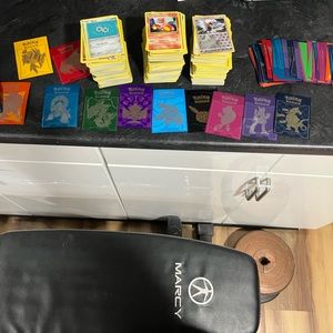 3 stacks of random Pokémon cards